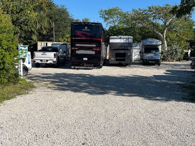 Wide view of Kings Row Storage lot with RVs and trailers parked